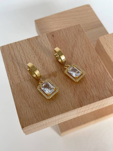 Baget ve Zirkon Taşlı Sallantılı Çelik Gold Küpe