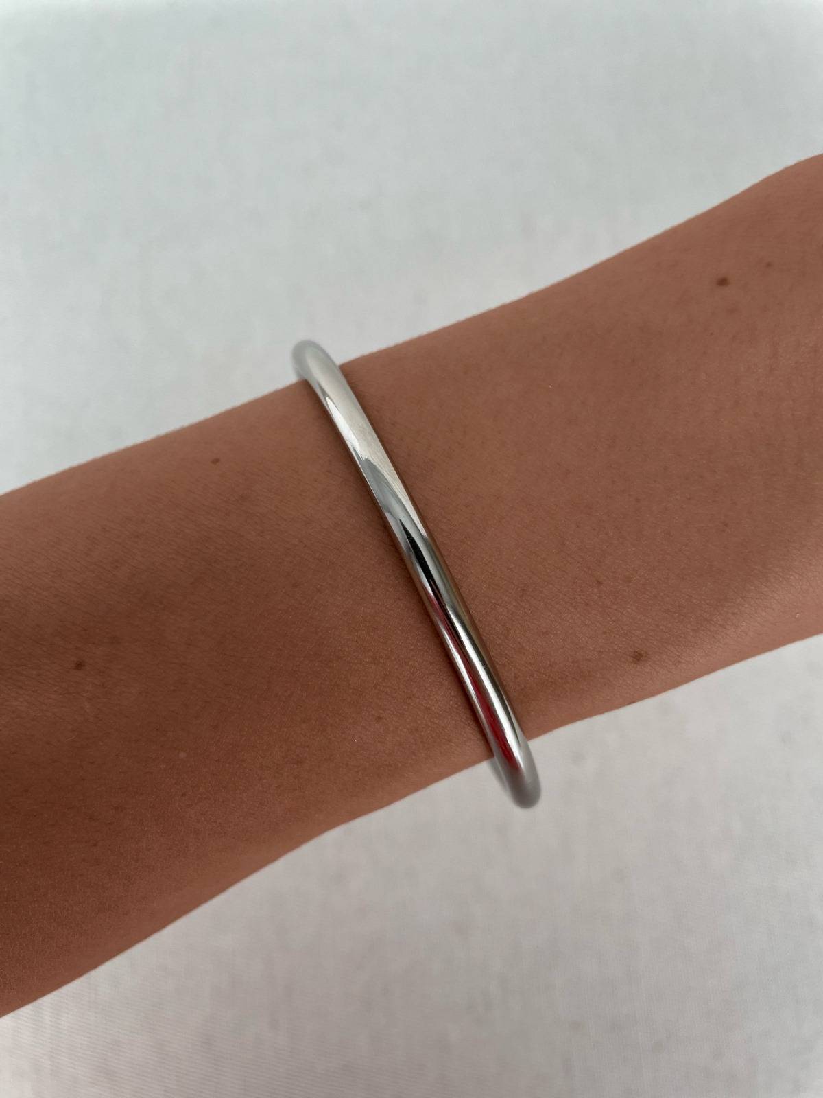 1689184547-64aee92311de660008.jpg Kalın Çelik Gümüş Ajda Bileklik