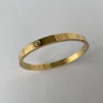 Çelik Marka İçi Yazılı Gold Kelepçe Bileklik