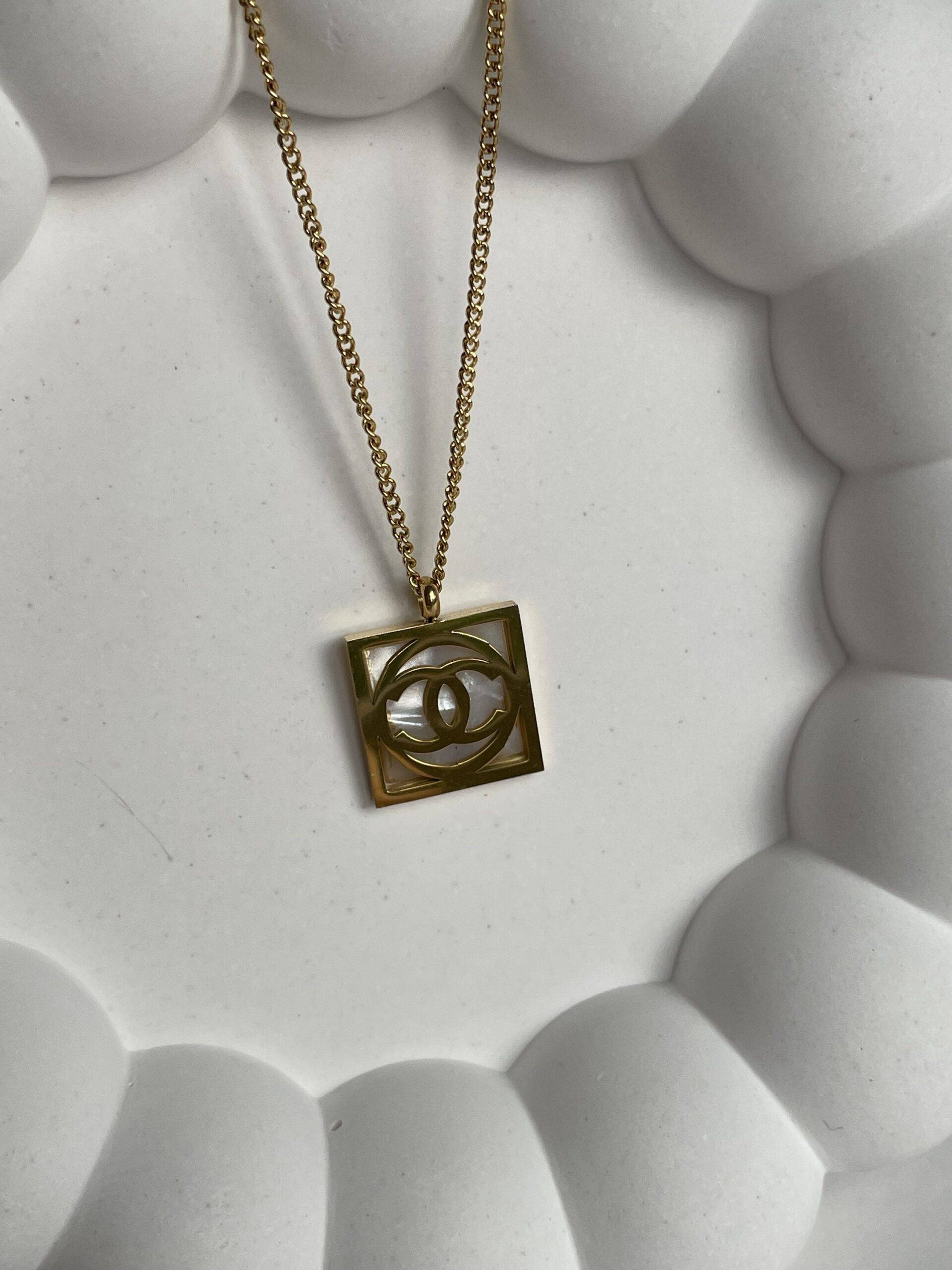 img_5961 Çelik İki Taraflı Marka Sedefli Kolye