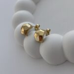 Çelik Asimetrik Desen Fasulye Gold Küpe