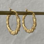 Çelik Desenli Sarmal Tasarım Halka Gold Küpe