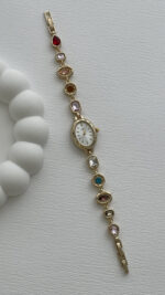 Marka Model Oval Tasarım Pembe & Mavi Baget Taşlı Kadranı Beyaz Gold Vintage Saat - Görsel 4