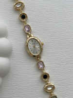 Marka Model Oval Tasarım Pembe & Siyah Baget Taşlı Kadranı Beyaz Gold Vintage Saat - Görsel 2