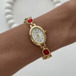 Marka Model Oval Tasarım Kırmızı & Siyah Baget Taşlı Kadranı Beyaz Gold Vintage Saat