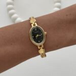 Oval Tasarım Kadranı Siyah Gold Vintage Saat